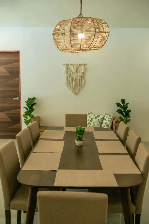 Long dining table set with placemats