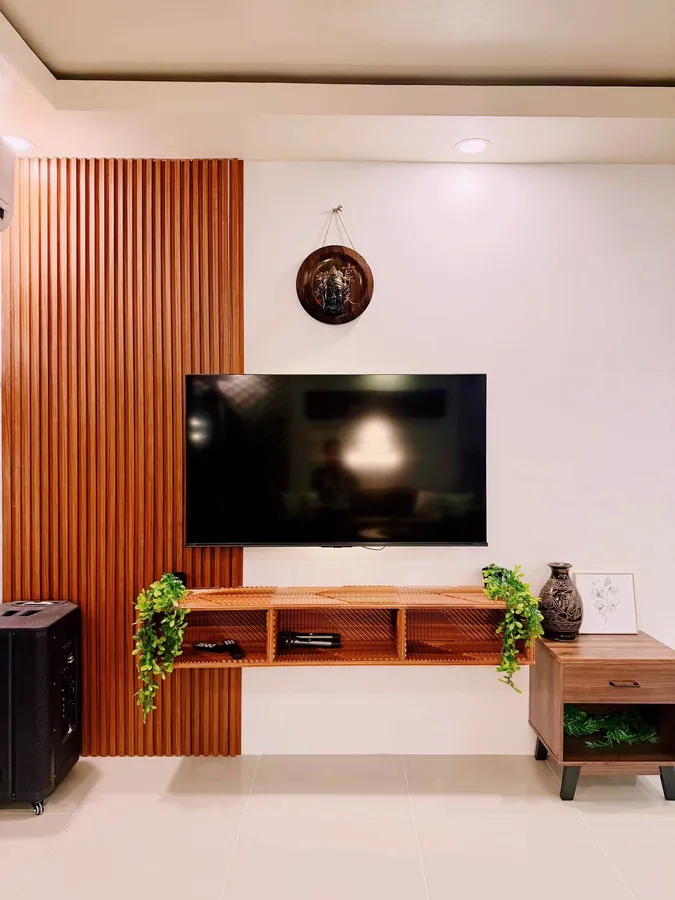 TV and wood slat wall