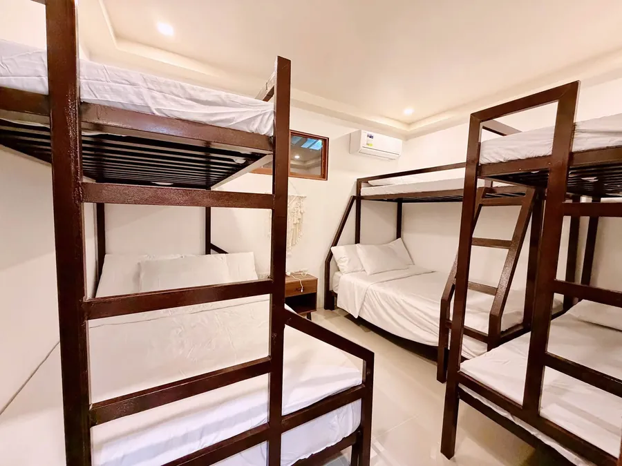Bunk room with fresh white linen