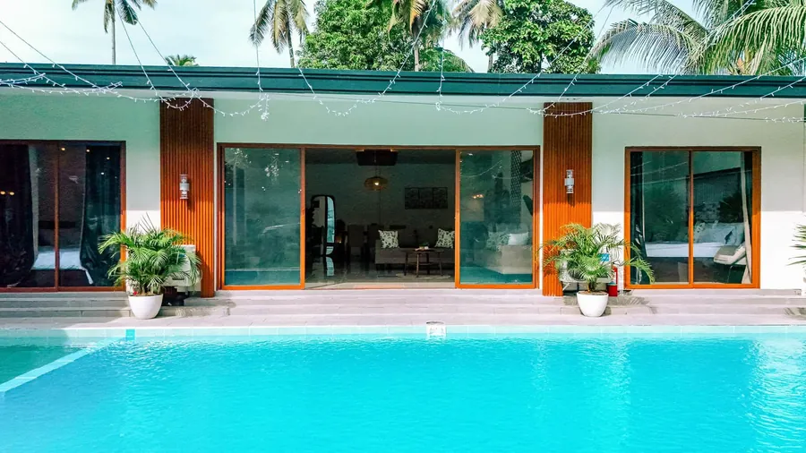 Villa frontage and private pool in daylight